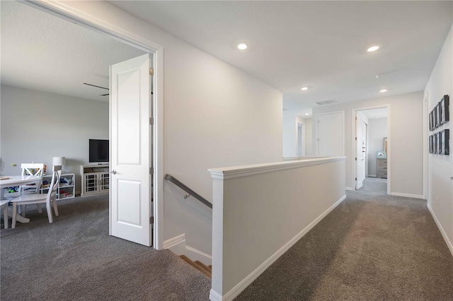 hallway with baseboards, recessed lighting, carpet, an upstairs landing, and visible vents