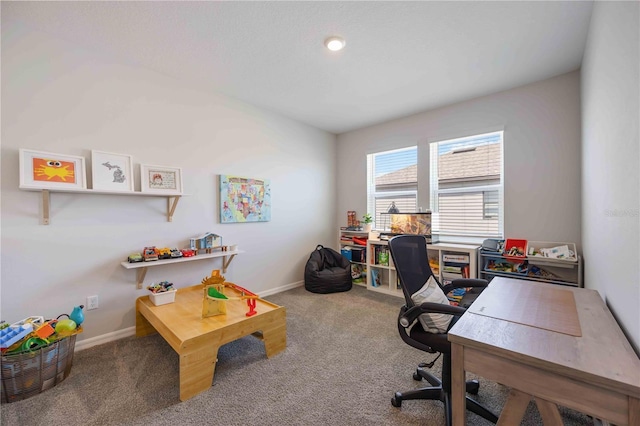 carpeted office space featuring baseboards