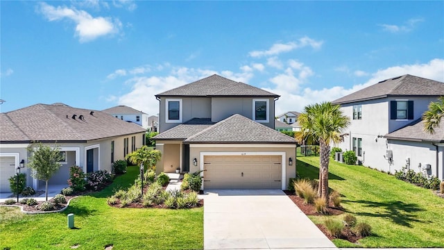 traditional-style house with a front lawn, driveway, a garage, stucco siding, and a residential view