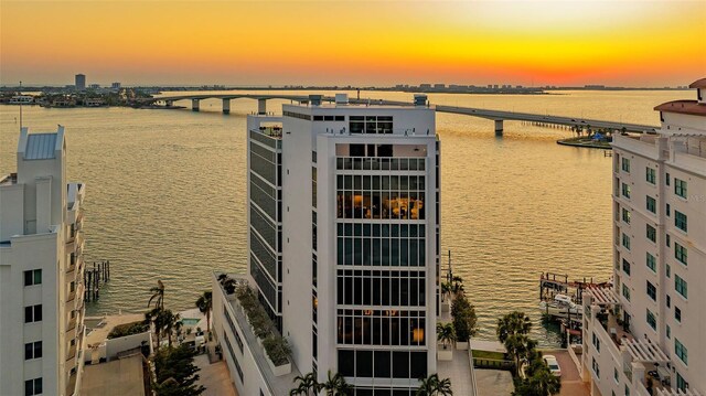 280 Golden Gate Pt Unit 600, Sarasota, FL 34236 - view of building exterior with a water view