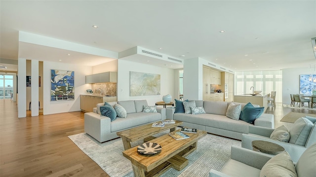 280 Golden Gate Pt Unit 600, Sarasota, FL 34236 - living area with recessed lighting and light wood-type flooring