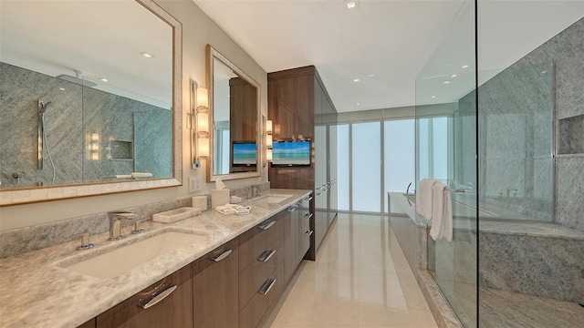 280 Golden Gate Pt Unit 600, Sarasota, FL 34236 - bathroom with walk in shower, double vanity, tile patterned flooring, and a sink