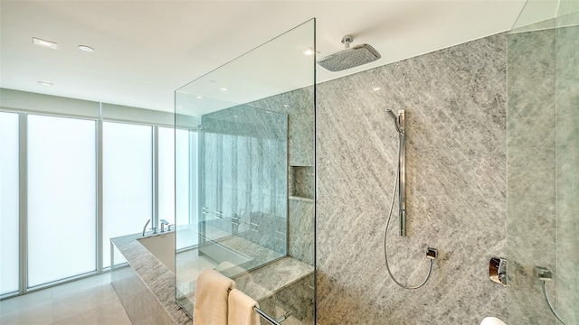 280 Golden Gate Pt Unit 600, Sarasota, FL 34236 - full bath featuring walk in shower, tile patterned floors, recessed lighting, and a bathtub