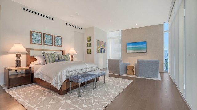 280 Golden Gate Pt Unit 600, Sarasota, FL 34236 - bedroom with visible vents and wood finished floors