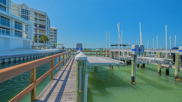 280 Golden Gate Pt Unit 600, Sarasota, FL 34236 - view of dock featuring boat lift and a water view