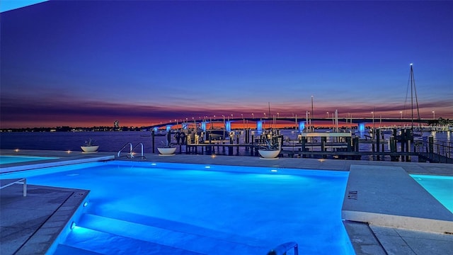 280 Golden Gate Pt Unit 600, Sarasota, FL 34236 - pool at dusk with an outdoor pool