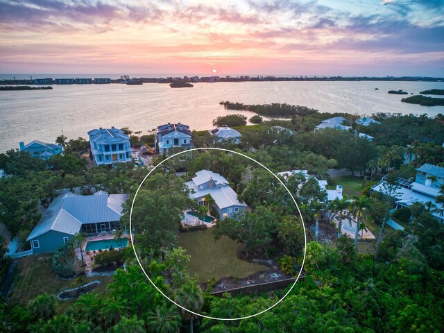 8871 Fishermens Bay Dr, Sarasota, FL 34231 - drone / aerial view featuring a water view