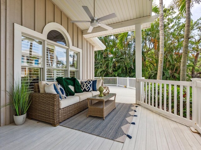 8871 Fishermens Bay Dr, Sarasota, FL 34231 - deck with ceiling fan and an outdoor hangout area