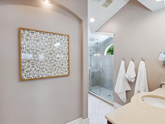 8871 Fishermens Bay Dr, Sarasota, FL 34231 - full bath with vanity, visible vents, a shower stall, and tile patterned flooring