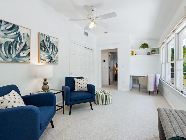 8871 Fishermens Bay Dr, Sarasota, FL 34231 - living area featuring visible vents, ceiling fan, carpet, and baseboards