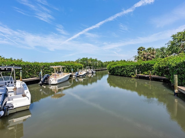 8871 Fishermens Bay Dr, Sarasota, FL 34231 - view of dock with a water view