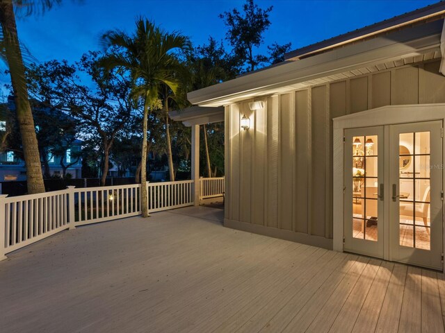 8871 Fishermens Bay Dr, Sarasota, FL 34231 - wooden deck with french doors