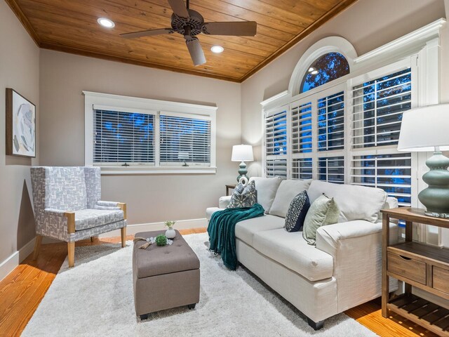 8871 Fishermens Bay Dr, Sarasota, FL 34231 - living room featuring wood finished floors, wood ceiling, ornamental molding, baseboards, and a ceiling fan