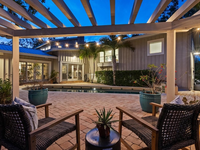 8871 Fishermens Bay Dr, Sarasota, FL 34231 - view of patio with a pergola, an outdoor pool, and french doors