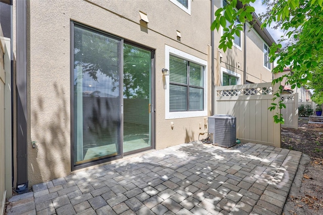 288 Crew Ct, Sarasota, FL 34243 - view of patio with fence and cooling unit