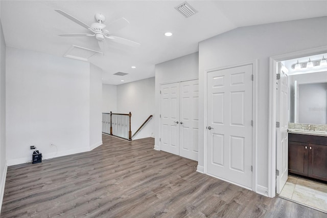 288 Crew Ct, Sarasota, FL 34243 - basement with ceiling fan, visible vents, baseboards, light wood finished floors, and recessed lighting