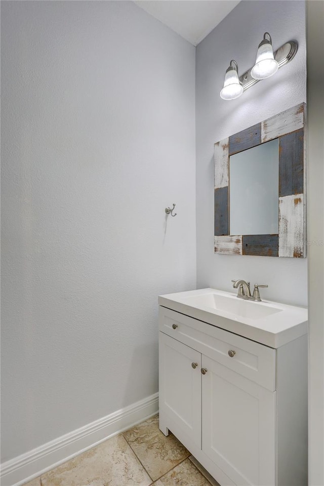 288 Crew Ct, Sarasota, FL 34243 - bathroom with baseboards and vanity