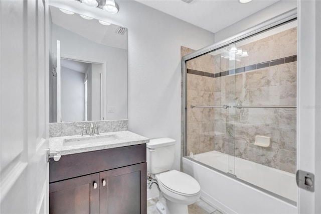 288 Crew Ct, Sarasota, FL 34243 - bathroom with vanity, enclosed tub / shower combo, and toilet