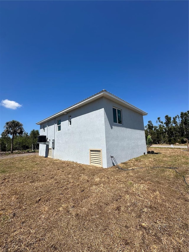 14343 Myakka Ave, Port Charlotte, FL 33953 - view of home's exterior featuring stucco siding