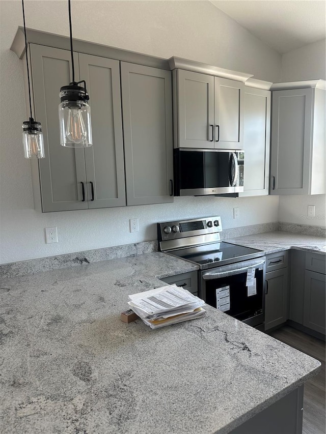14343 Myakka Ave, Port Charlotte, FL 33953 - kitchen with appliances with stainless steel finishes, gray cabinetry, light stone countertops, and hanging light fixtures