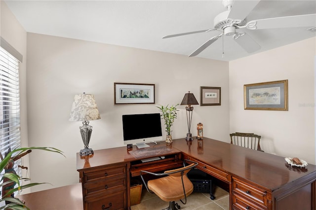 home office with ceiling fan and tile patterned flooring