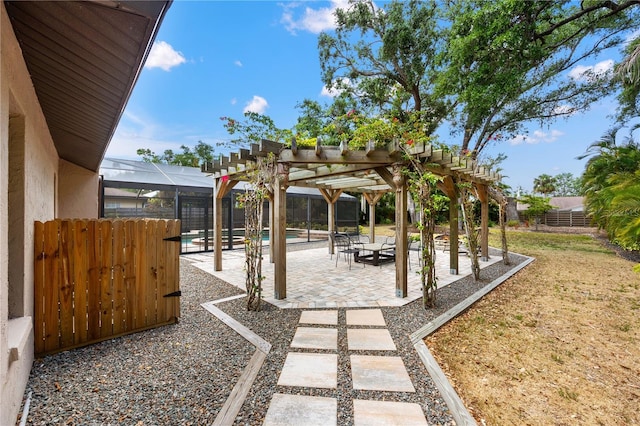 view of yard with a fenced in pool, a fenced backyard, a patio area, and a pergola