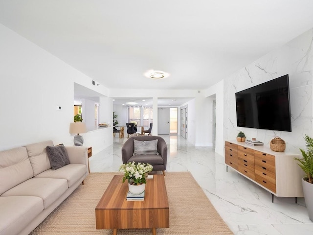 1255 N Gulfstream Ave Unit 402, Sarasota, FL 34236 - living area featuring light marble finish flooring