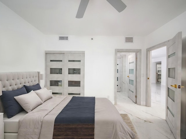 1255 N Gulfstream Ave Unit 402, Sarasota, FL 34236 - bedroom featuring light marble finish floors and ceiling fan