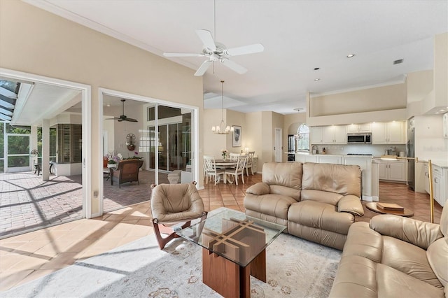 living area featuring a ceiling fan, ornamental molding, light tile patterned floors, and recessed lighting