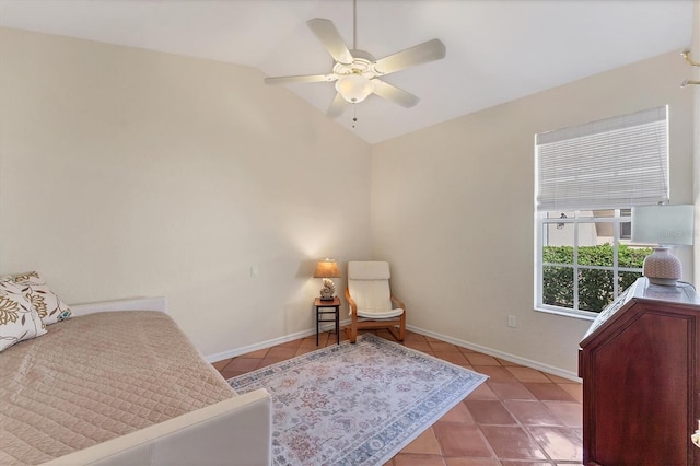bedroom with tile patterned flooring, ceiling fan, lofted ceiling, and baseboards