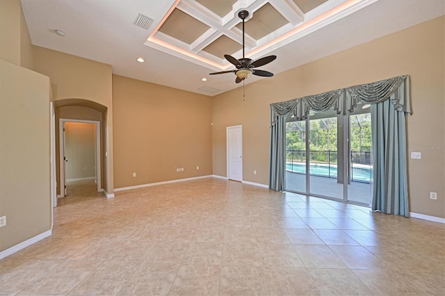 15518 29th St E, Parrish, FL 34219 - empty room featuring coffered ceiling, arched walkways, a towering ceiling, a ceiling fan, and recessed lighting