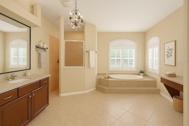 15518 29th St E, Parrish, FL 34219 - full bathroom featuring tile patterned floors, a garden tub, walk in shower, vanity, and baseboards