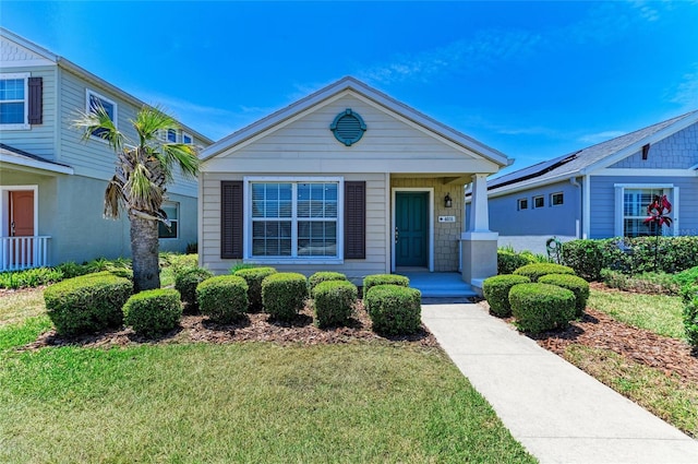 view of front facade with a front yard