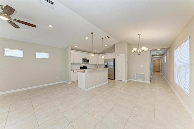 kitchen featuring visible vents, open floor plan, appliances with stainless steel finishes, and lofted ceiling