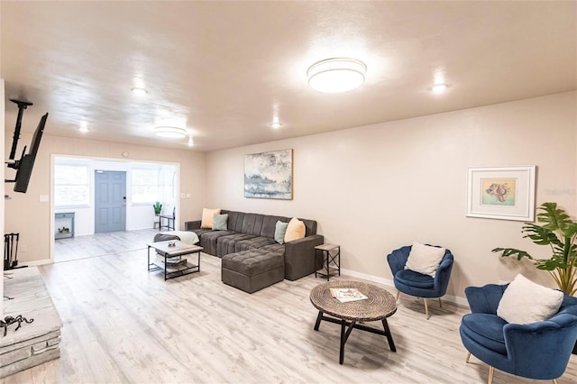 104 Shoreland Dr, Osprey, FL 34229 - living area with baseboards and wood finished floors
