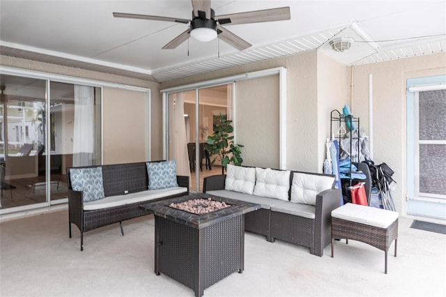 104 Shoreland Dr, Osprey, FL 34229 - view of patio / terrace with ceiling fan and an outdoor living space with a fire pit