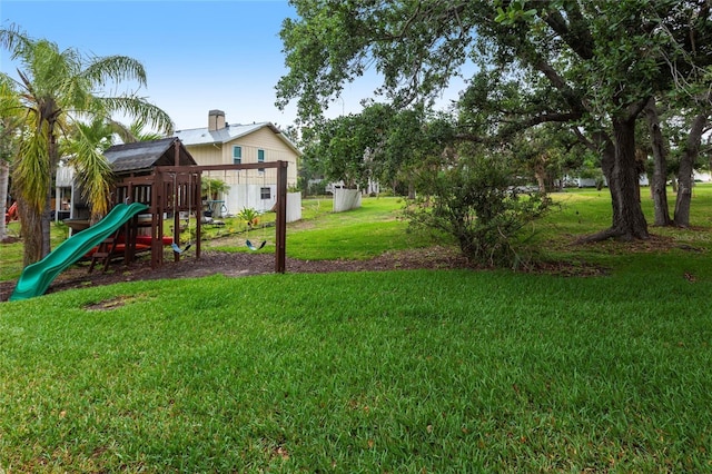 104 Shoreland Dr, Osprey, FL 34229 - view of play area featuring a yard