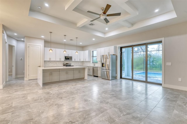 22 Medalist Cir, Rotonda West, FL 33947 - kitchen with a ceiling fan, visible vents, backsplash, light countertops, and appliances with stainless steel finishes