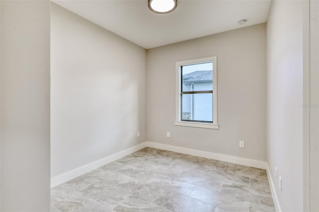 22 Medalist Cir, Rotonda West, FL 33947 - spare room featuring baseboards