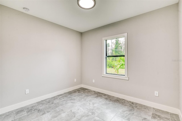 22 Medalist Cir, Rotonda West, FL 33947 - unfurnished room featuring baseboards