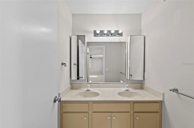 bathroom with double vanity and a sink