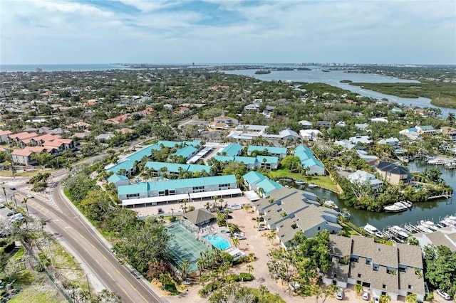 aerial view with a residential view and a water view