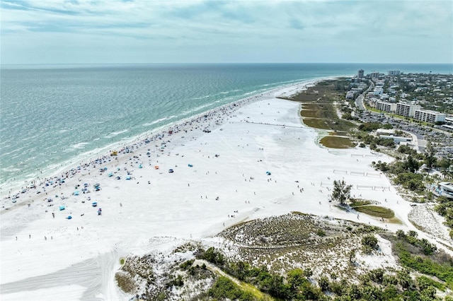 drone / aerial view with a view of the beach and a water view