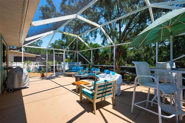 4219 Berkshire Dr, Sarasota, FL 34241 - view of patio featuring fence, an outdoor living space with a fire pit, and glass enclosure