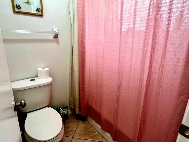 4219 Berkshire Dr, Sarasota, FL 34241 - full bath featuring toilet and tile patterned flooring