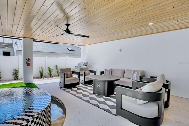 723 S Blvd Of The Presidents, Sarasota, FL 34236 - view of patio / terrace with a pool, a ceiling fan, an outdoor living space with a fire pit, and a fenced backyard