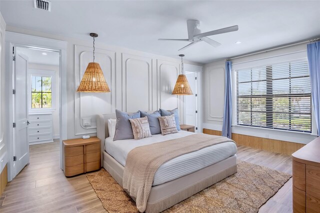 723 S Blvd Of The Presidents, Sarasota, FL 34236 - bedroom featuring recessed lighting, light wood-type flooring, visible vents, and ceiling fan