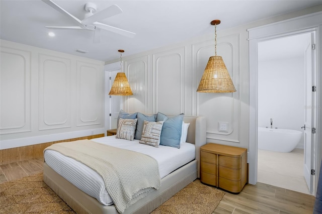723 S Blvd Of The Presidents, Sarasota, FL 34236 - bedroom with light wood-style floors and a ceiling fan