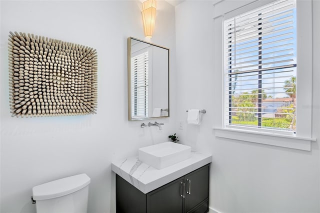 723 S Blvd Of The Presidents, Sarasota, FL 34236 - bathroom featuring toilet and vanity
