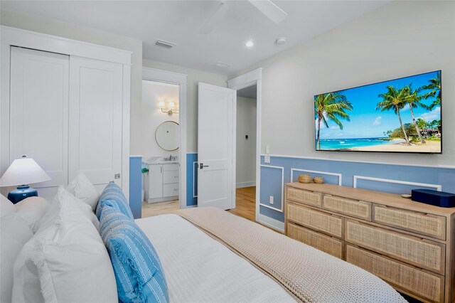 723 S Blvd Of The Presidents, Sarasota, FL 34236 - bedroom featuring a ceiling fan, visible vents, connected bathroom, and a closet
